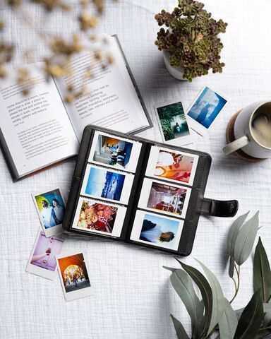instax frames in a photo album